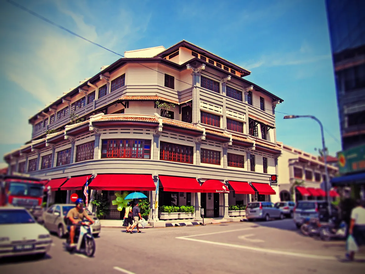 Authentic boutique hotel interior with antique furniture, ornate details and historic charm in UNESCO heritage site